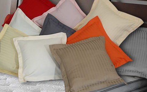 Assorted pillow covers and cushions